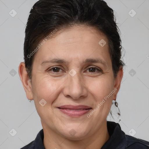 Joyful white adult female with medium  brown hair and brown eyes