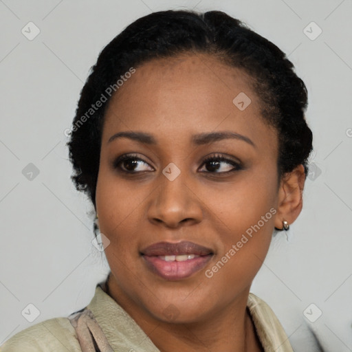 Joyful latino young-adult female with short  black hair and brown eyes