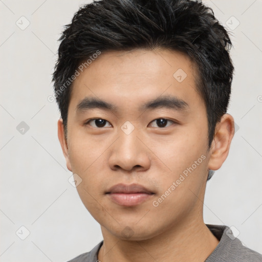 Neutral asian young-adult male with short  black hair and brown eyes