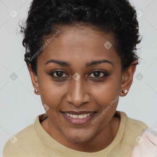 Joyful black young-adult female with short  brown hair and brown eyes