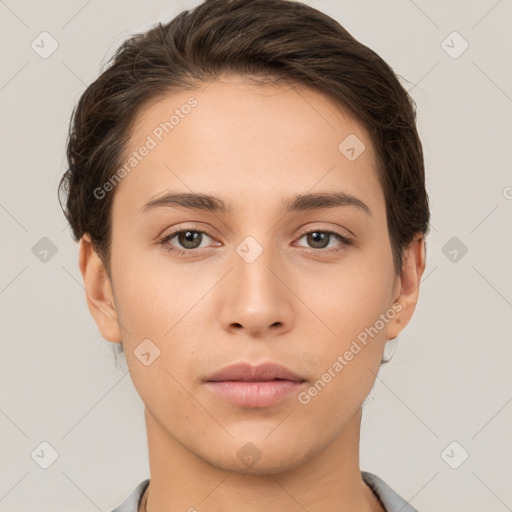 Neutral white young-adult female with short  brown hair and brown eyes