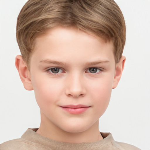 Joyful white child male with short  brown hair and grey eyes