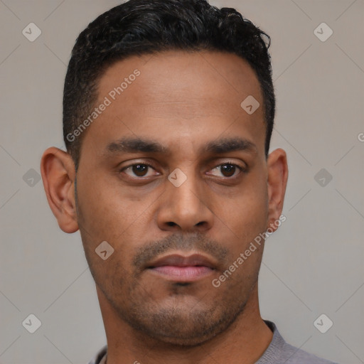 Neutral latino young-adult male with short  black hair and brown eyes