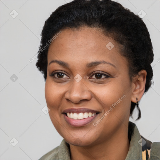 Joyful latino young-adult female with short  brown hair and brown eyes