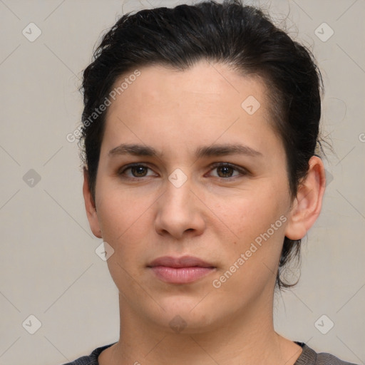 Neutral white young-adult female with short  brown hair and brown eyes