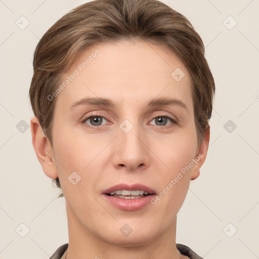 Joyful white young-adult female with short  brown hair and grey eyes