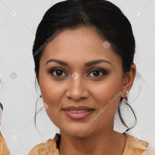 Joyful latino young-adult female with medium  brown hair and brown eyes