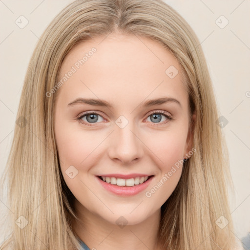 Joyful white young-adult female with long  brown hair and blue eyes