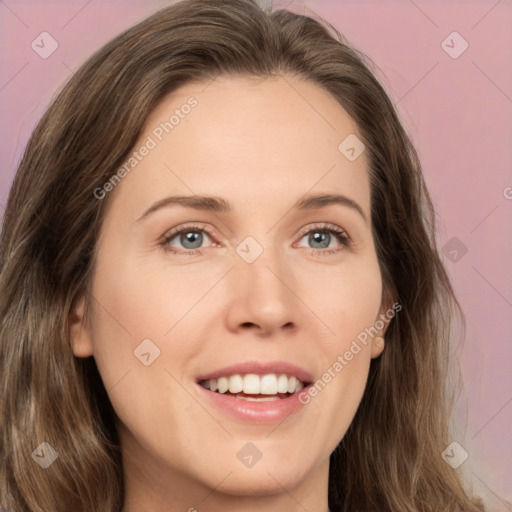 Joyful white young-adult female with long  brown hair and green eyes