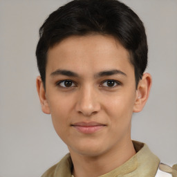 Joyful latino young-adult male with short  brown hair and brown eyes