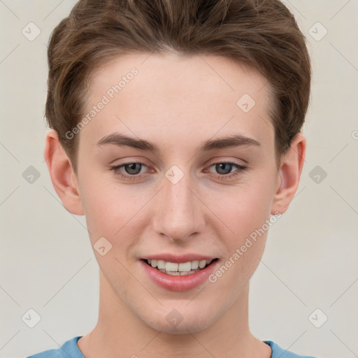 Joyful white young-adult female with short  brown hair and grey eyes