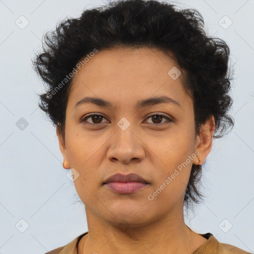 Joyful latino young-adult female with short  brown hair and brown eyes