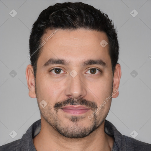 Joyful white young-adult male with short  black hair and brown eyes