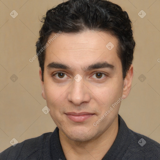 Joyful white young-adult male with short  black hair and brown eyes