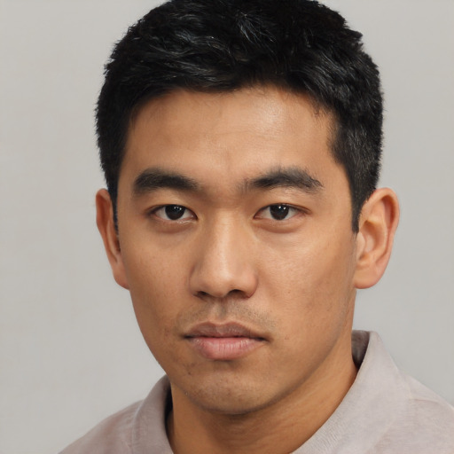 Neutral asian young-adult male with short  black hair and brown eyes