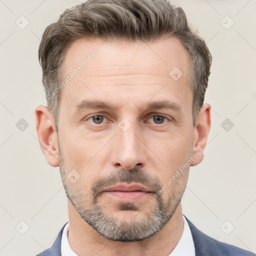 Neutral white adult male with short  brown hair and brown eyes