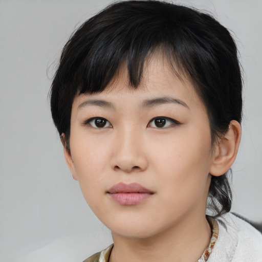 Neutral asian young-adult female with medium  black hair and brown eyes