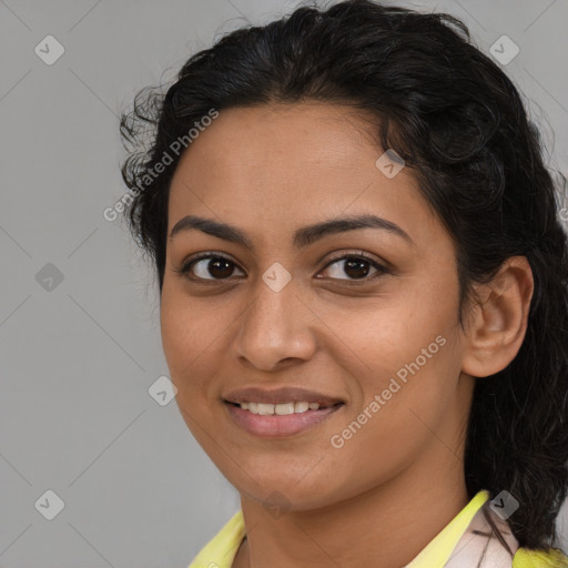 Joyful latino young-adult female with medium  brown hair and brown eyes