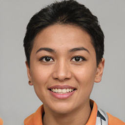 Joyful asian young-adult female with short  black hair and brown eyes