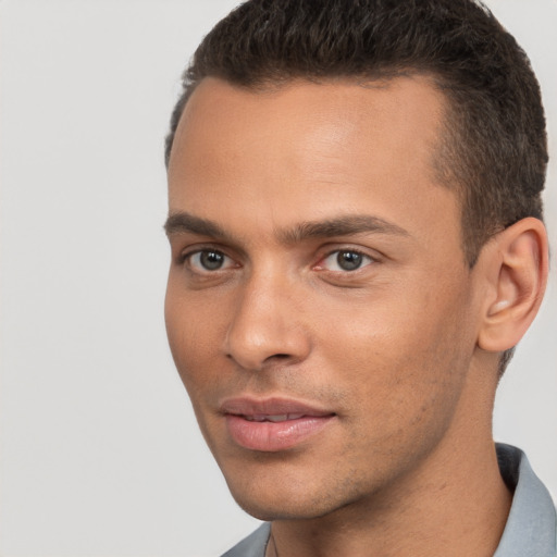 Neutral white young-adult male with short  brown hair and brown eyes