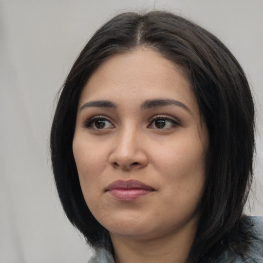 Neutral latino young-adult female with medium  black hair and brown eyes