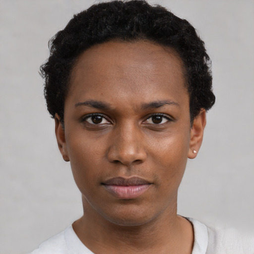 Neutral black young-adult female with short  black hair and brown eyes