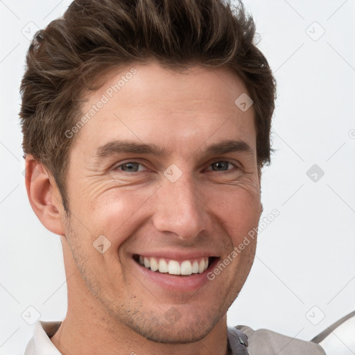 Joyful white adult male with short  brown hair and grey eyes