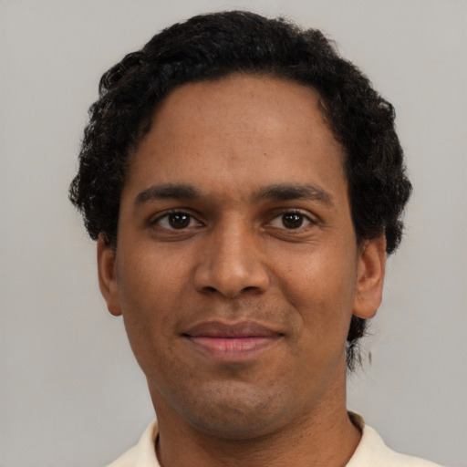 Neutral black adult male with short  black hair and brown eyes