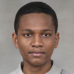 Neutral latino young-adult male with short  brown hair and brown eyes