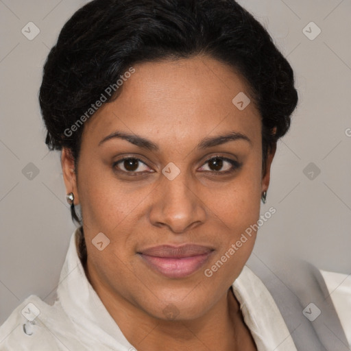 Joyful latino adult female with short  brown hair and brown eyes