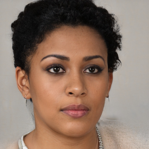 Neutral latino young-adult female with short  brown hair and brown eyes