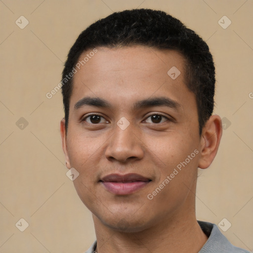 Joyful latino young-adult male with short  black hair and brown eyes