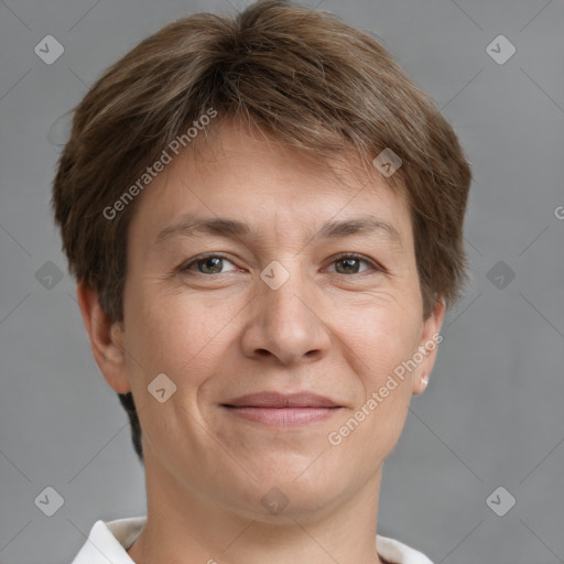 Joyful white adult male with short  brown hair and grey eyes