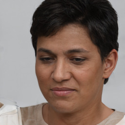 Joyful white adult female with short  brown hair and brown eyes