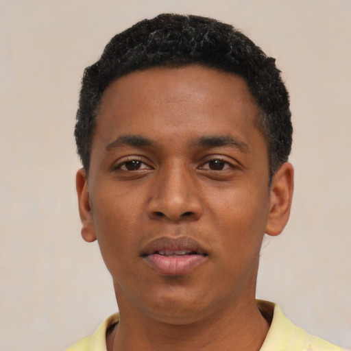 Neutral black young-adult male with short  black hair and brown eyes