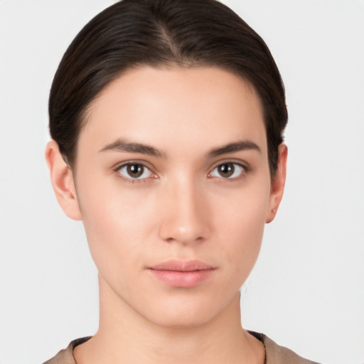 Neutral white young-adult female with short  brown hair and brown eyes