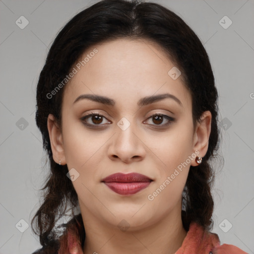 Joyful latino young-adult female with medium  brown hair and brown eyes