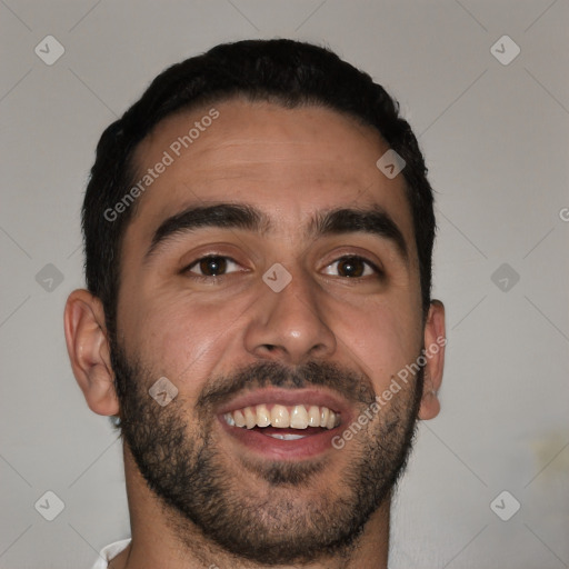 Joyful white young-adult male with short  black hair and brown eyes