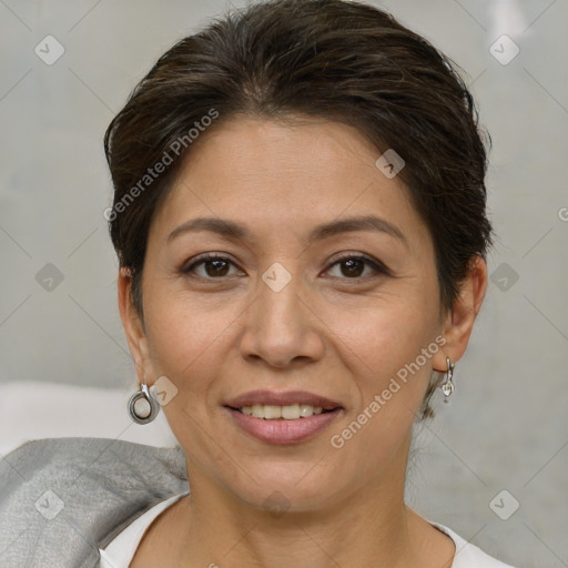 Joyful white adult female with short  brown hair and brown eyes