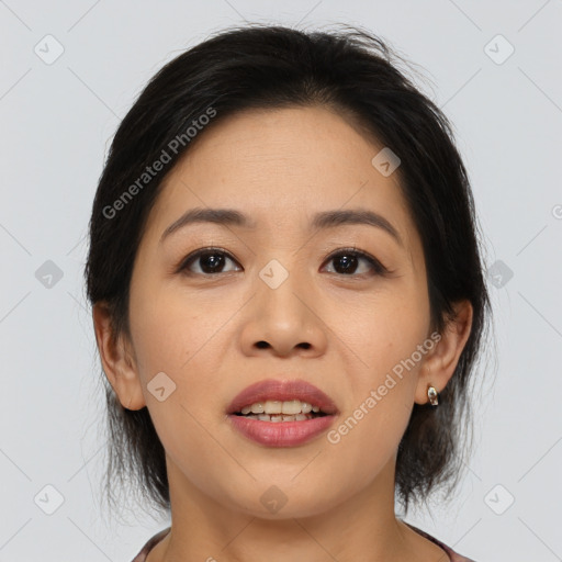 Joyful asian young-adult female with medium  brown hair and brown eyes