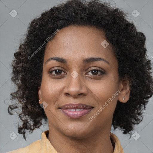 Joyful black young-adult female with medium  brown hair and brown eyes