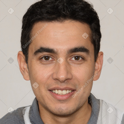 Joyful white young-adult male with short  black hair and brown eyes