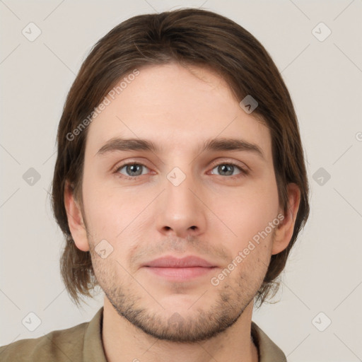 Neutral white young-adult male with short  brown hair and grey eyes