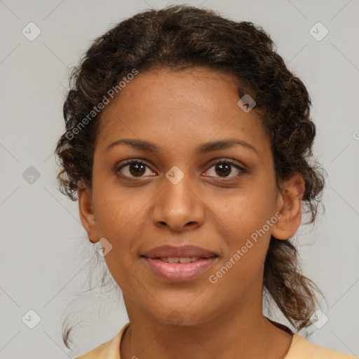 Joyful black young-adult female with medium  brown hair and brown eyes