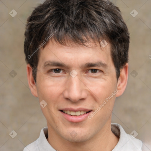 Joyful white adult male with short  brown hair and brown eyes