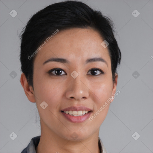 Joyful asian young-adult female with short  brown hair and brown eyes