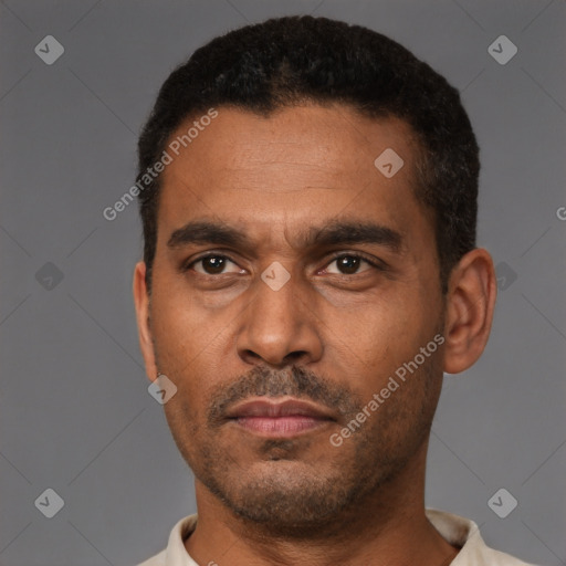 Neutral latino adult male with short  black hair and brown eyes