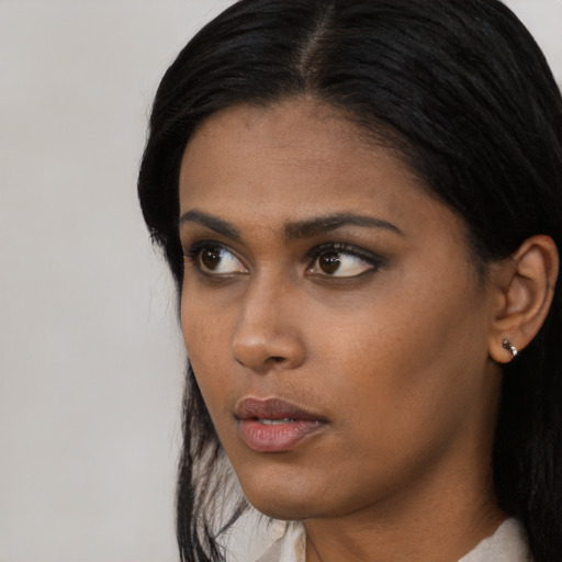 Neutral asian young-adult female with long  black hair and brown eyes