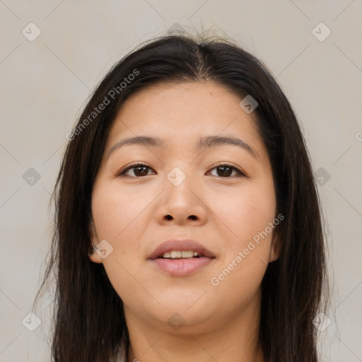 Joyful asian young-adult female with long  brown hair and brown eyes