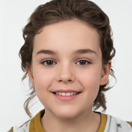 Joyful white child female with medium  brown hair and brown eyes